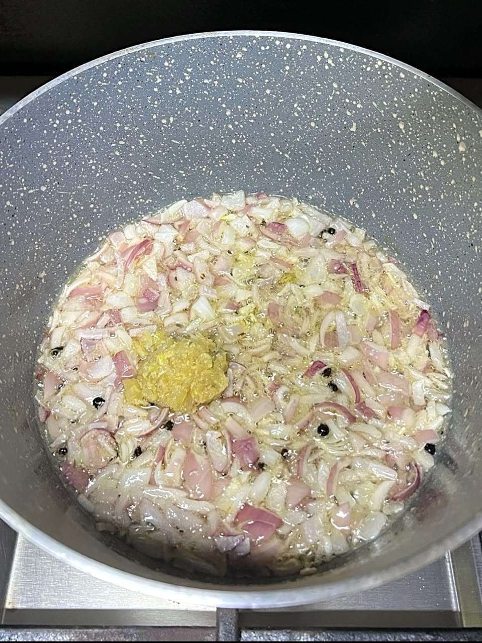 Ginger garlic paste added to sautéed onions.