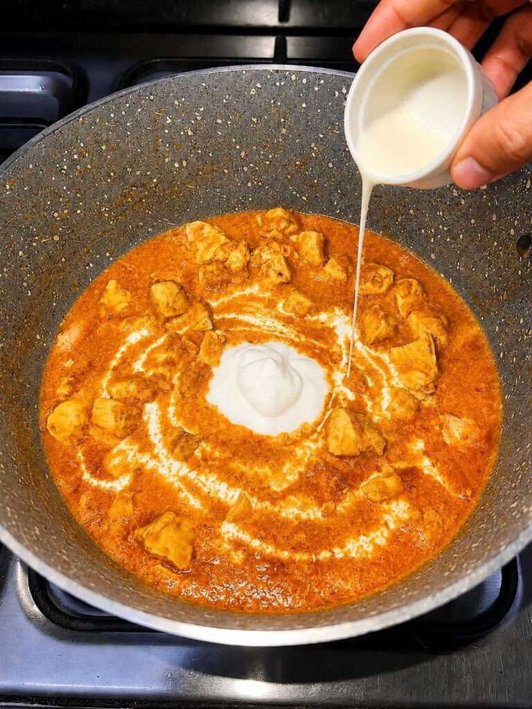 Cream and yogurt added to chicken handi gravy