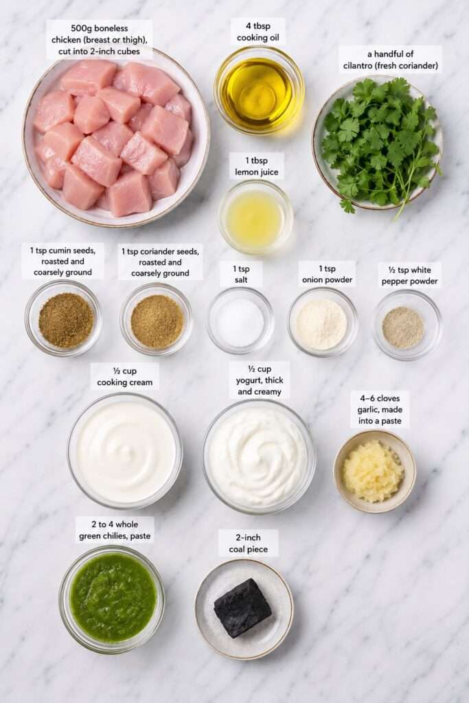 Ingredients needed to make Chicken Malai Tikka including chicken, yogurt, cream, spices, cilantro, garlic, and green chilies.