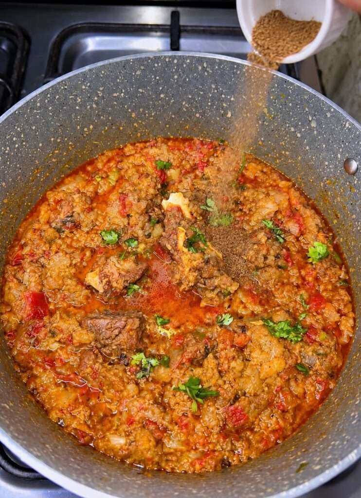 Mashed turnips added to meat curry with kasuri methi and cilantro